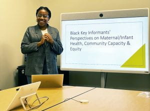 Image of Portia Egbu presenting research